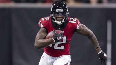 Atlanta Falcons wide receiver Mohamed Sanu (12) breaks for a drink during  an NFL football training camp practice, Tuesday, July 23, 2019, in Flowery  Branch, Ga. (AP Photo/Andrea Smith Stock Photo - Alamy