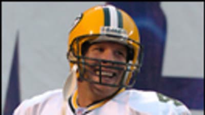 Green Bay Packers quarterback Brett Favre completed 22 of 30 passes for 399  yards and four touchdowns during 41-7 victory over the Oakland Raiders  during an NFL football game at Network Associates