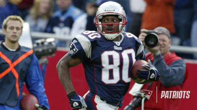 Troy Brown and his teammates with their Super Bowl Rings