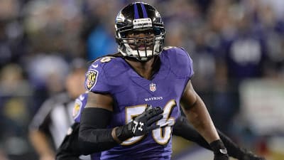 Baltimore Ravens linebacker Josh Bynes (56) walks off the field