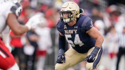 Ravens bring back defensive end Brent Urban, sign former Navy