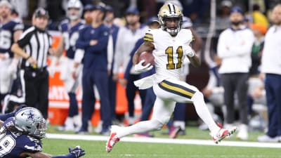 New Orleans Saints' Deonte Harris (11) runs back a punt against the Tampa  Bay Buccaneers during …