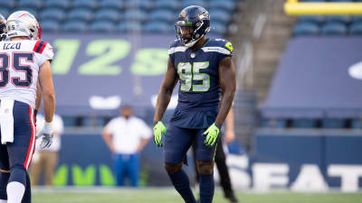 Seattle Seahawks defensive end Benson Mayowa (10) lines up against