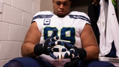 Seattle Seahawks defensive tackle Al Woods (99), middle, stands on the  field during the second half of an NFL football game against the Los  Angeles Rams, Sunday, Jan. 8, 2023, in Seattle. (