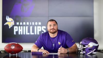 Harrison Phillips of the Minnesota Vikings walks to the tunnel