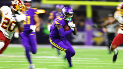 Fox sideline reporter Erin Andrews interviews Minnesota Vikings running  back Dalvin Cook, left, after an NFL football game against the Washington  Redskins, Thursday, Oct. 24, 2019, in Minneapolis. The Vikings won 19-9. (