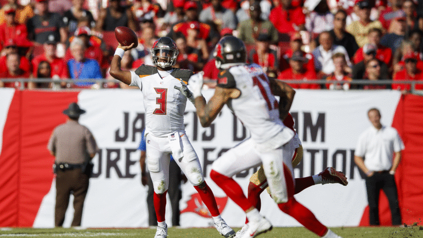 TAMPA, FL - NOVEMBER 25, 2018 - Quarterback Jameis Winston #3 looks downfield toward Wide Receiver Mike Evans #13 during the game between the Tampa Bay Buccaneers and San Francisco 49ers at Raymond James Stadium in Tampa, FL. The Buccaneers won 27-9. Photo By Matt May/Tampa Bay Buccaneers