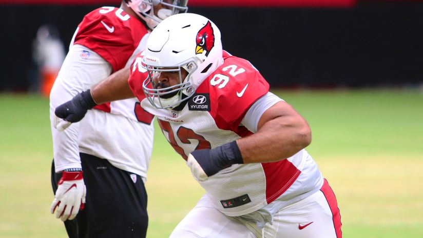 Rookie defensive lineman Rashard Lawrence takes part in a drill during Wednesday's training camp practice.