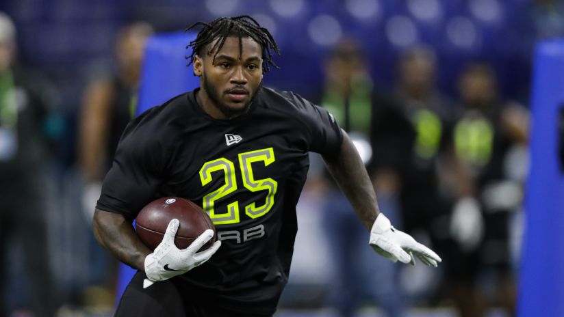 Georgia running back D'Andre Swift runs a drill at the NFL football scouting combine in Indianapolis, Friday, Feb. 28, 2020. (AP Photo/Michael Conroy)