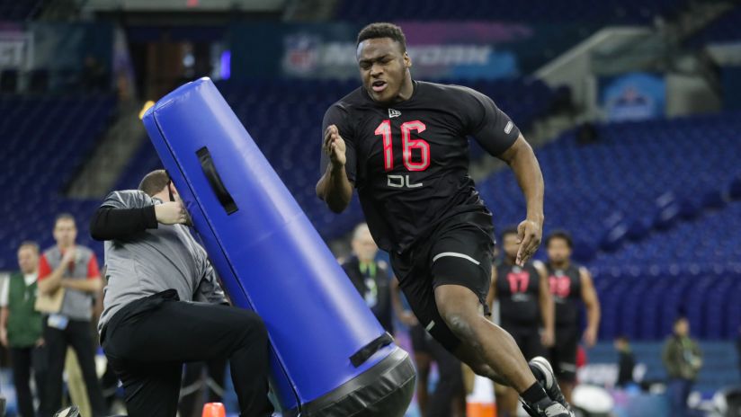 Texas A&M defensive lineman Justin Madubuike runs a drill at the NFL football scouting combine in Indianapolis, Saturday, Feb. 29, 2020. (AP Photo/Michael Conroy)