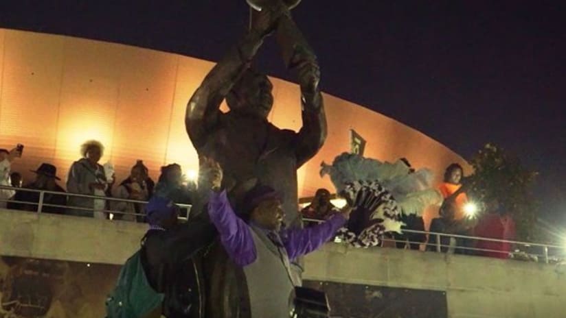 Tom Benson now has a stadium named after him, with a statue