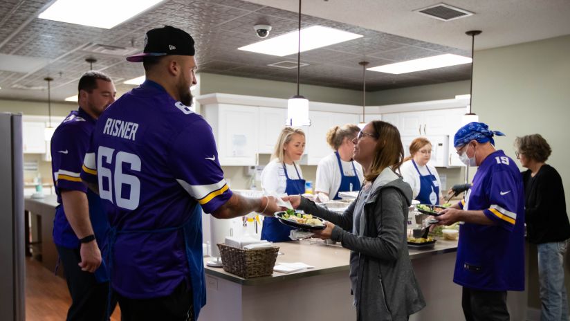Vikings Crucial Catch Shoes Unite Staff in Fight Against Cancer