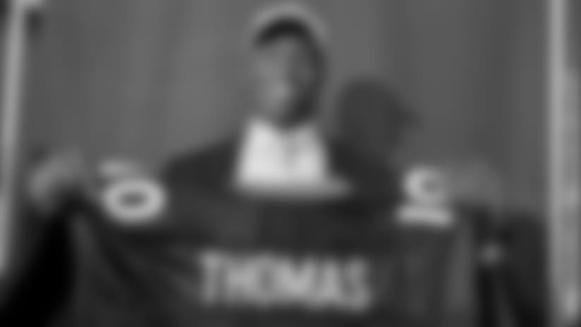 First-round draft pick Demaryius Thomas displays his jersey to the media during his introductory press conference on April 23, 2010.