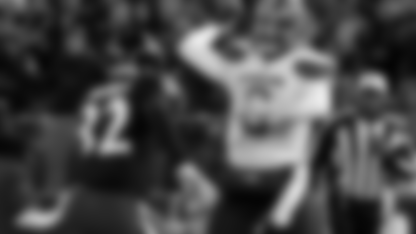 Cleveland Browns quarterback Baker Mayfield, right, throws a pass as he is pressured by Baltimore Ravens free safety Eric Weddle in the first half of an NFL football game, Sunday, Dec. 30, 2018, in Baltimore. (AP Photo/Carolyn Kaster)