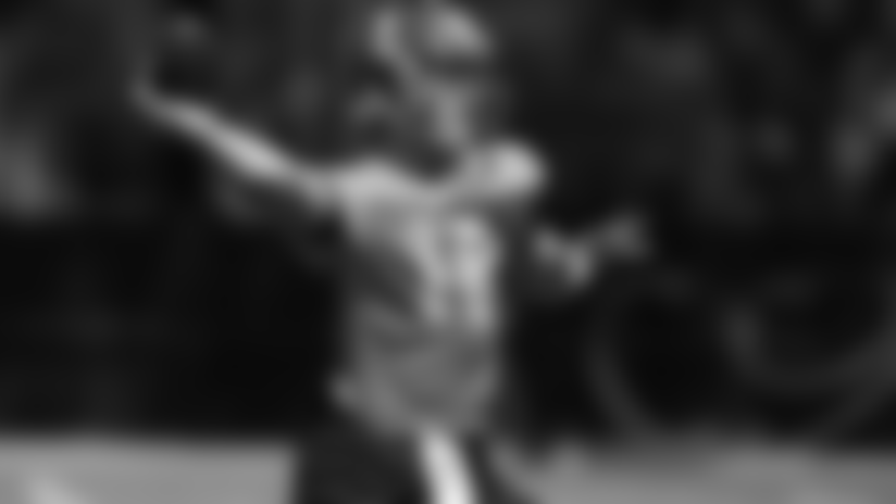 Wyoming's Brett Smith, an undrafted free agent signing from the previous weekend, was the only quarterback in town, so he was a very busy man. Smith might have been tired by the end of the weekend, but his coach believes it was a good experience for him. - Scott Smith
