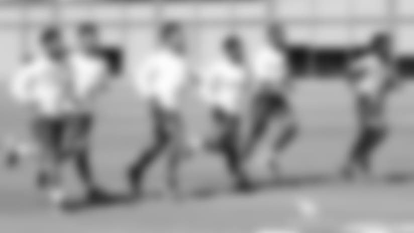 RB Chase Edmonds (third from right) running with his fellow skill players.