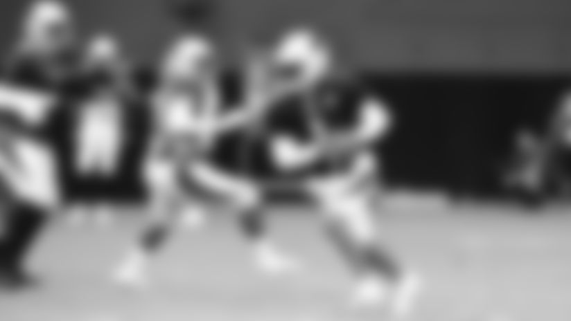 QB Kyler Murray runs the ball during a training camp practice in 2019