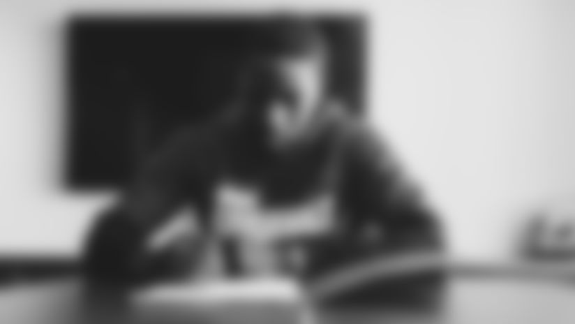 Images of wide receiver A.J. Green signing his one-year deal with the Cardinals.