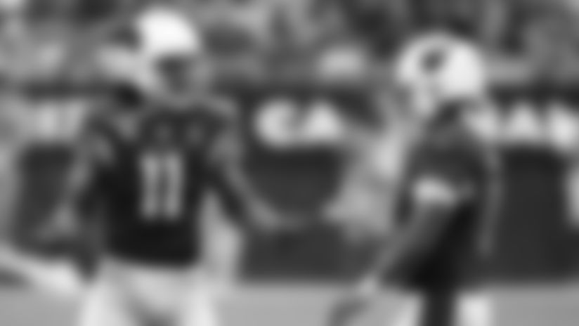 WR Larry Fitzgerald and QB Kyler Murray try to figure out what went wrong against Panthers 2019