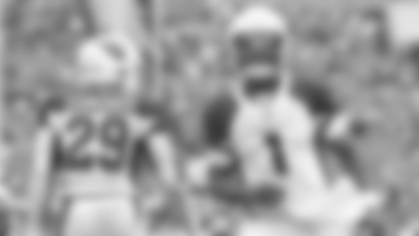 Arizona Cardinals quarterback Kyler Murray (1) celebrates a touchdown with running back Chase Edmonds (29) to an NFL game against the Cincinnati Bengals, Sunday, Oct. 6, 2019, in Cincinnati. The Cardinals defeated the Bengals 26-23. (Margaret Bowles via AP)