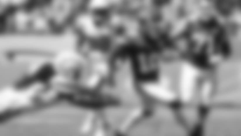 Kansas City Chiefs wide receiver Tyreek Hill (10) catches a pass and breaks a tackle on his way to his second touchdown