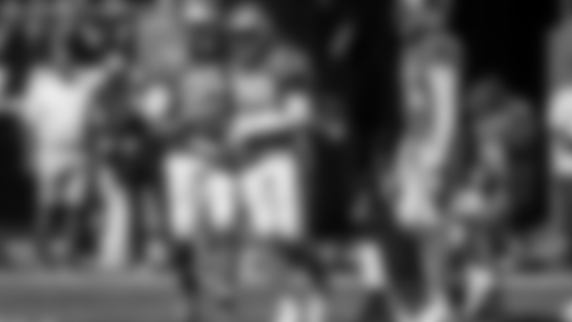 Mike Adams, Eric Reid celebrate interception