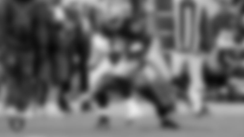 With the Raiders currently holding the No. 17 overall pick in the 2021 NFL Draft, take a look back at photos of former cornerback Phillip Buchanon — the last player the Silver and Black selected at No. 17 overall.