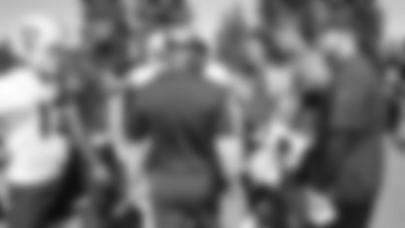 Oakland Raiders wide receiver Griff Whalen (13), quarterback EJ Manuel (3), fullback Keith Smith (41), head coach Jon Gruden, wide receiver Seth Roberts (10), quarterback Derek Carr (4), quarterback Connor Cook (18), and quarterbacks coach Brian Callahan on the field for practice at 2018 Training Camp at The Oakland Raiders Napa Valley Training Complex, Saturday, August 4, 2018, in Napa, California.