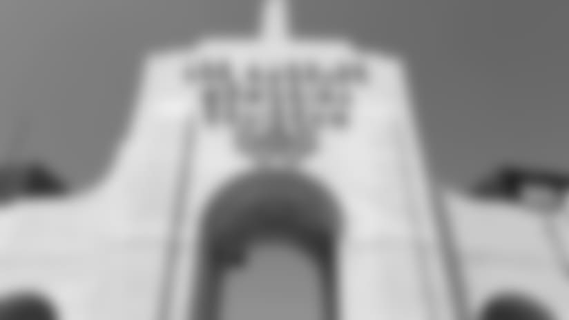 General overall view of Los Angeles Memorial Coliseum peristyle and Olympic torch during renovation in Los Angeles, Wednesday, Aug. 15, 2018. The $270 million project funded by USC includes the construction of a structure on the south side of the stadium with suites, loge boxes, club seats, concourse and press box, and replacement of every seat. The renovation will reduce seating capacity to 77,500 and is scheduled to be completed in 2019 on the stadium, which hosted the opening closing ceremonies of the 1932 and 1984 Olympic Games and Super Bowl I. (Kirby Lee via AP)