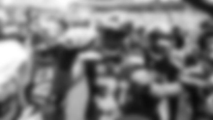 Defensive captain Kam Chancellor gathers the defensive backs for their traditional huddle before taking the field as the fans slowly begin to filter into CenturyLink Field.