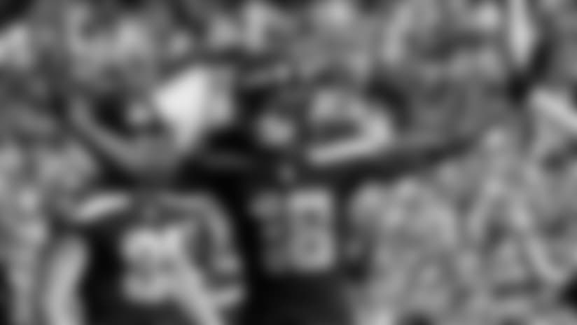 Receiver Jaron Brown celebrates after his touchdown catch.