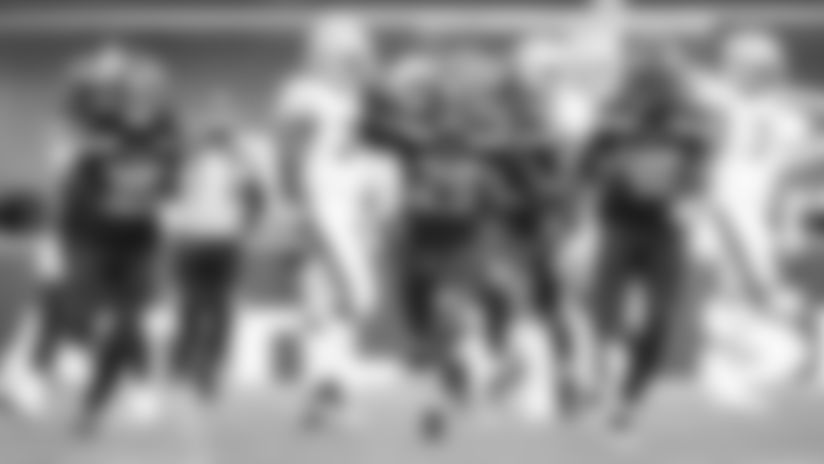 Seahawks cornerback D.J. Reed celebrates with Ryan Neal (35) and Stephen Sullivan (48) after intercepting a pass against his former team.