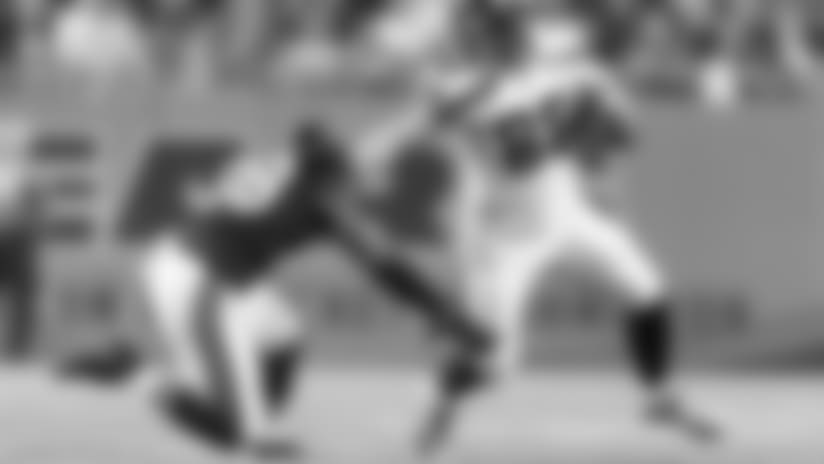 Seahawks tight end Will Dissly offers a stiff arm on a gain in the first quarter.