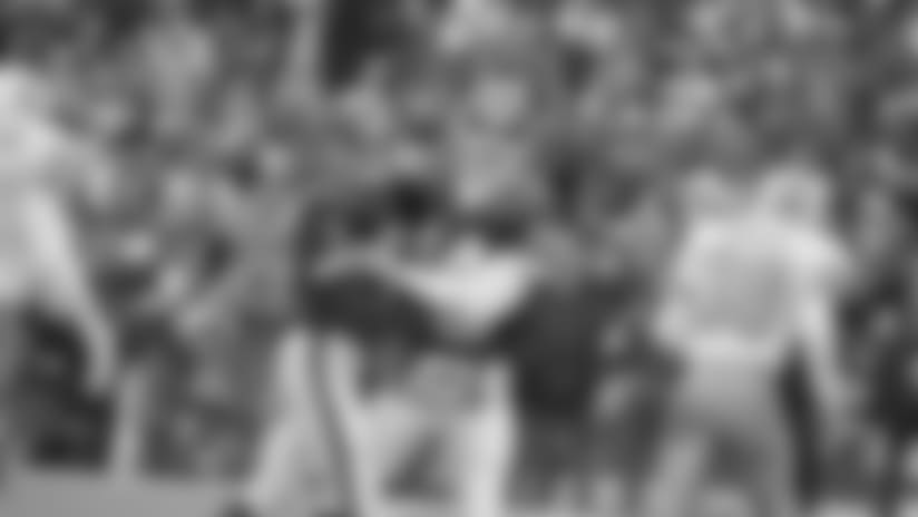 Buffalo Bills kicker Steve Christie, left, and quarterback Frank Reich celebrates Christie?s first quarter field goal against the Houston Oilers on Sunday, Jan. 4, 1993 at Rich Stadium in Orchard Park. Reich engineered the greatest comeback in NFL history and Christie kicked the winning field goal in overtime to beat the Oilers 41-38. (AP Photo/John Hickey)