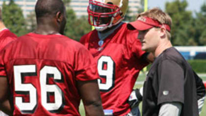 Tackle Kwame Harris of the San Francisco 49ers takes a break against