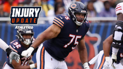 Chicago Bears tackle Larry Borom (75) runs off the field at halftime of an  NFL football game against the New England Patriots, Monday, Oct. 24, 2022,  in Foxborough, Mass. (AP Photo/Stew Milne