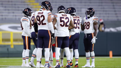 Chicago Bears defensive end Yannick Ngakoue (91) looks on from the  sidelines during the first half of an NFL preseason football game,  Saturday, Aug. 26, 2023, in Chicago. (AP Photo/Kamil Krzaczynski Stock