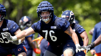 Chicago Bears offensive tackle Teven Jenkins (76) runs off the