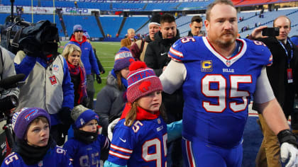 An emotional Kyle Williams walks off the field with one final victory