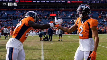 Denver Broncos wide receiver Brandon Johnson (89) is covered by