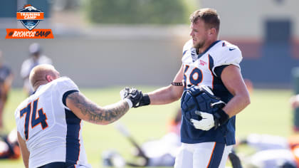 Denver Broncos defensive coordinator Vance Joseph, right, gestures