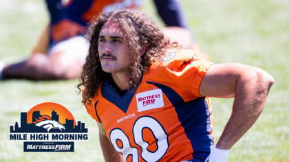 Tight end Greg Dulcich of the Denver Broncos runs onto the field