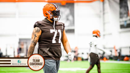 Jedrick Wills Jr. #71 of the Cleveland Browns walks to the bench