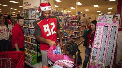 Bucs D-Line delivers special Christmas for kids