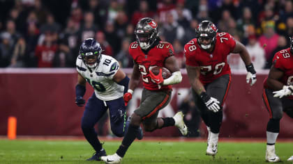 Tampa Bay Buccaneers running back Rachaad White (29) run after shaking a  defender during an NFL wild-card football game against the Dallas Cowboys,  Monday, Jan. 16, 2023, in Tampa, Fla. (AP Photo/Peter