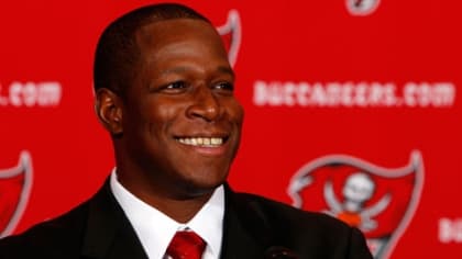 13 SEP 2009: Head Coach Raheem Morris of the Buccaneers in the red shirt  watches the instant replay during the game between the Dallas Cowboys and  the Tampa Bay Buccaneers at Raymond