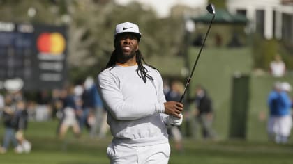 Larry Fitzgerald gets a hole in one, with former President Obama as witness