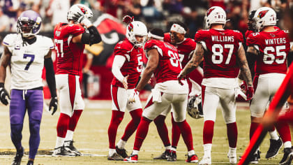 December 05, 2021: Chicago, Illinois, U.S. - Cardinals #14 Andy Lee holds  the ball for kicker #5 Matt Prater during the NFL Game between the Arizona  Cardinals and Chicago Bears at Soldier