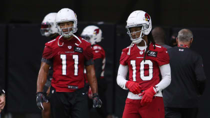 Arizona Cardinals' Larry Fitzgerald (11) runs drills during the