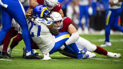 Arizona Cardinals defensive end Zach Allen engulfs New England Patriots  quarterback Mac Jones with some force for 10-yard sack